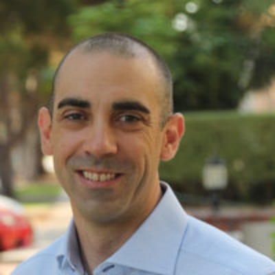 Headshot of Golfer Journeys Managing Editor and Co-Founder Eric Salsa